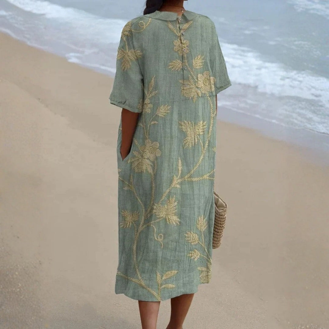 Ibiza - Vestido Floral con un Encantador Cuello Peter Pan